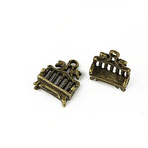 Charm bronz bancuta 16x12mm