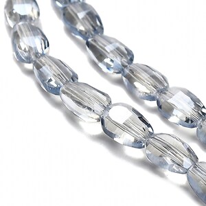 Sirag margele de sticla electroplacate oval aprox. 6,5x4,5x3mm - gri albastrui