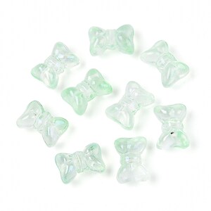 Margele de sticla fundita 10x14mm - verde transparent (50 grame)