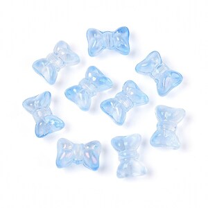 Margele de sticla fundita 10x14mm - albastru deschis (50 grame)