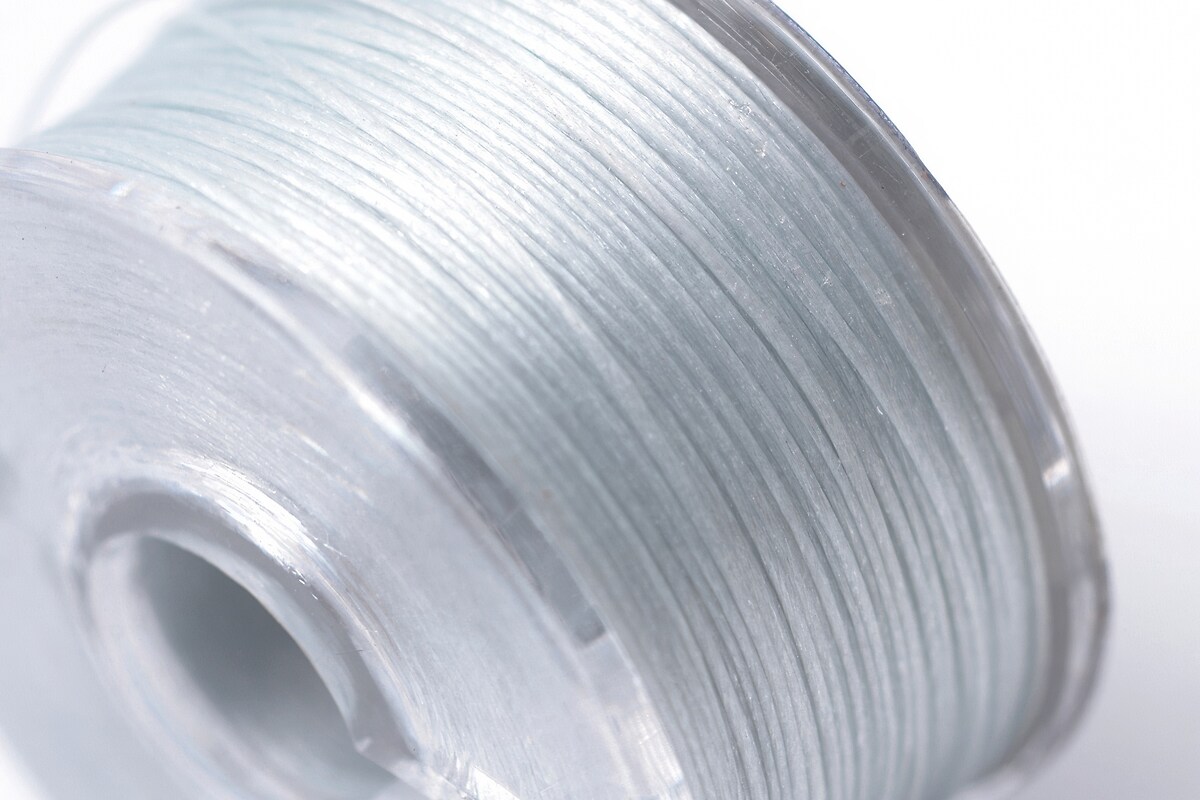 Rola guta elastica japoneza pentru margelele de nisip, grosime 0,1mm, rola aprox. 40m - albastru deschis