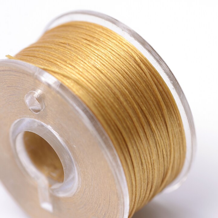 Rola guta elastica japoneza pentru margelele de nisip, grosime 0,1mm, rola aprox. 40m - galben auriu