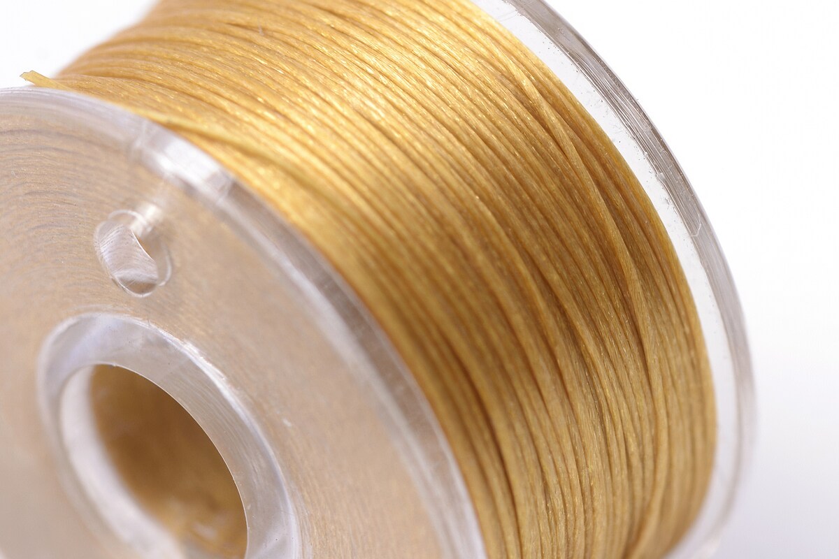 Rola guta elastica japoneza pentru margelele de nisip, grosime 0,1mm, rola aprox. 40m - galben auriu