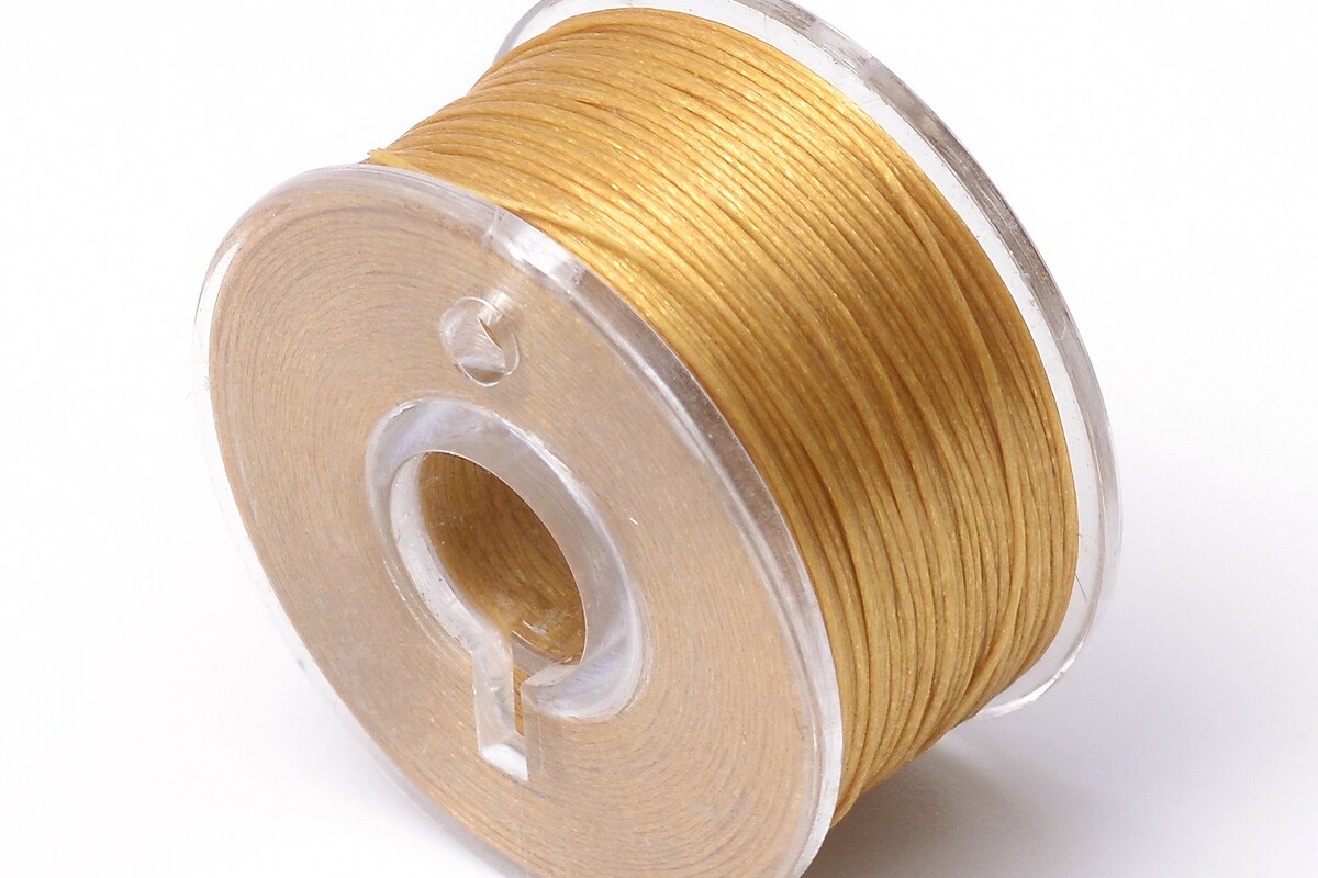 Rola guta elastica japoneza pentru margelele de nisip, grosime 0,1mm, rola aprox. 40m - galben auriu