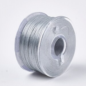 Rola guta elastica japoneza pentru margelele de nisip, grosime 0,1mm, rola aprox. 40m - gri