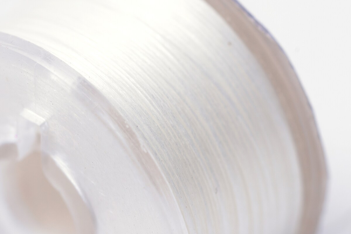 Rola guta elastica japoneza pentru margelele de nisip, grosime 0,1mm, rola aprox. 40m - alb