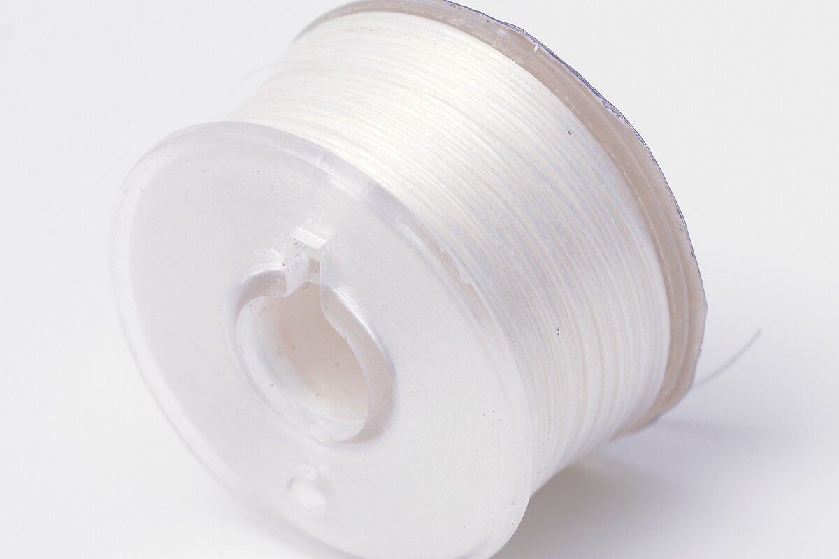 Rola guta elastica japoneza pentru margelele de nisip, grosime 0,1mm, rola aprox. 40m - alb