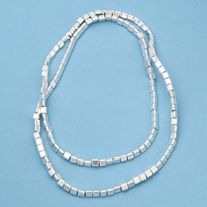 Hematit triunghi 3x2,5x2,7mm - placat argintiu (sirag)