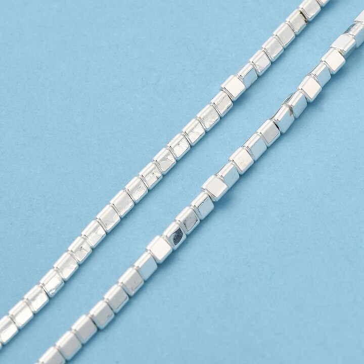 Hematit triunghi 3x2,5x2,7mm - placat argintiu (sirag)