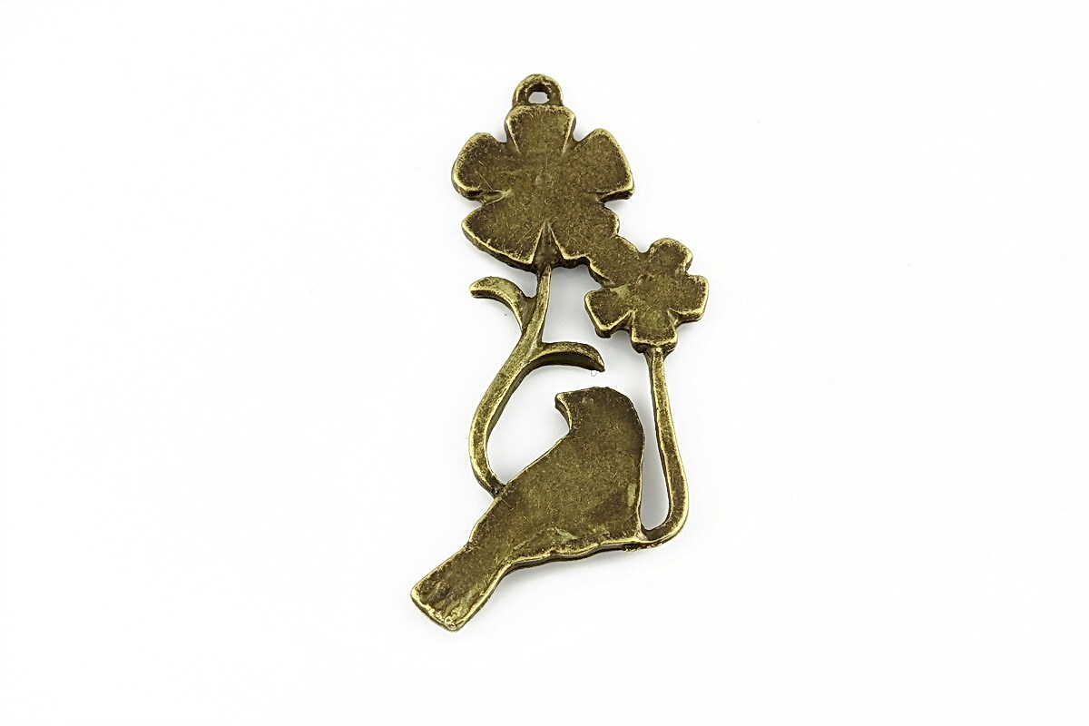 Charm bronz randunica si floricele 35x18mm