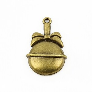 Charm bronz glob 33x20mm