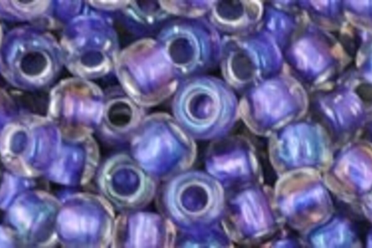 Margele Toho rotunde 6/0 - Inside-Color Rainbow Crystal/Metallic Purple Lined