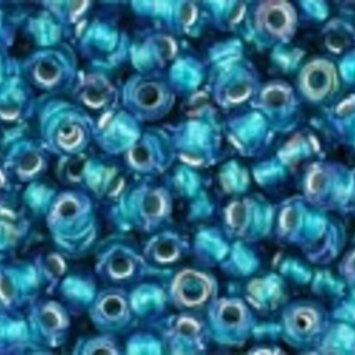 Margele Toho rotunde 11/0 - Inside-Color Rainbow Crystal/Green Teal Lined