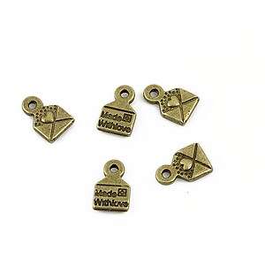 Charm bronz  plic 10x6,5mm