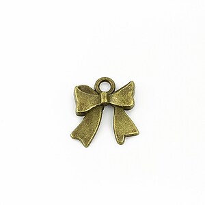 Charm bronz  fundita 17,5x16mm