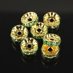 Distantiere aurii cu rhinestones verzi 10mm (rondele 3,5x10mm)