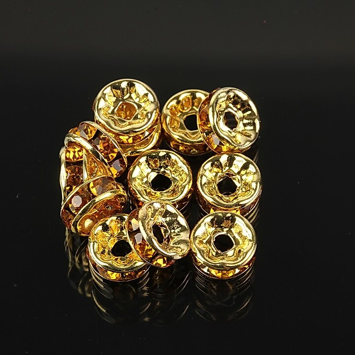 Distantiere aurii cu rhinestones galben inchis 8mm (rondele 3,5x8mm)