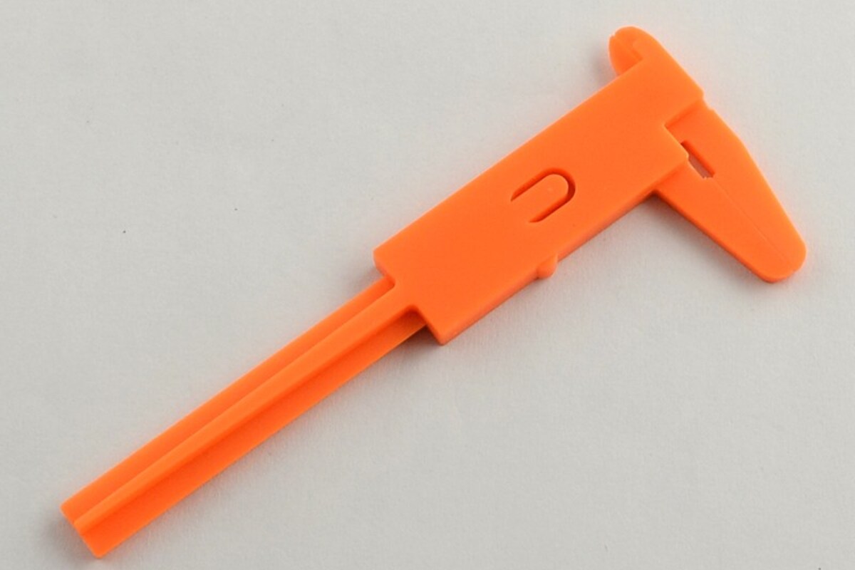 Subler de plastic portocaliu pentru masurarea margelelor 10,5x4,4x0,5cm